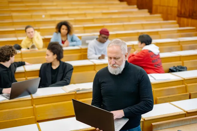 University students using laptops during a lecture