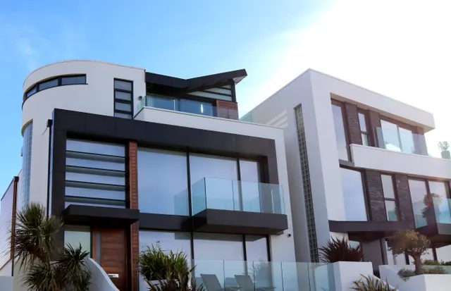 Contemporary residential building with large glass balconies